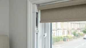 A detail view of a blackout roller blind side channel system designed to prevent light leakage.