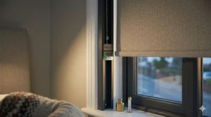 A demonstration of the thermal insulation benefits of blackout roller blinds, showing a temperature reading.