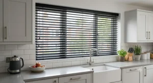 Contemporary black metal venetian blinds providing a sleek, minimalist look in a modern kitchen.