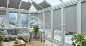 Thermal roller blinds closed in a conservatory during winter to provide extra insulation.