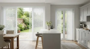 Bright kitchen diner with white vertical blinds fitted on large patio doors and french doors, offering privacy and light control.