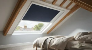 The best blackout skylight blinds fitted on a roof window in a British bedroom.