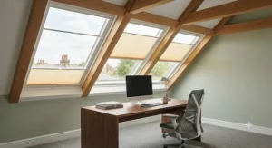 Pleated best skylight blinds softly diffusing daylight in a contemporary home office.
