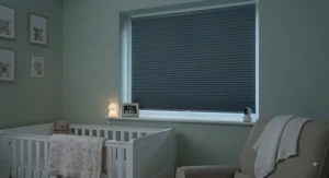 Blackout no drill pleated blinds keeping a child's nursery dark and peaceful during the day