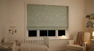 Blackout thermal roman blinds in a child's nursery, designed to keep the room warm and dark for bedtime.
