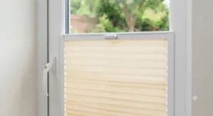 No-drill Perfect Fit pleated blinds mounted seamlessly onto a white uPVC double-glazed window frame.