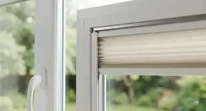 Close-up of best perfect fit blinds fitted directly onto a white uPVC double glazed window frame