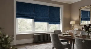Luxurious velvet thermal roman blinds in a sophisticated dining room, adding warmth and elegance to the interior.