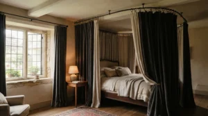 A stylishly draped bendable curtain pole for bay window in a cosy master bedroom with blackout drapes