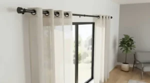 Modern metal best curtain poles holding contemporary eyelet curtains in a bright apartment.