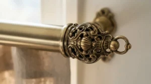 Ornate brass finial details on one of the best curtain poles in a traditional townhouse.