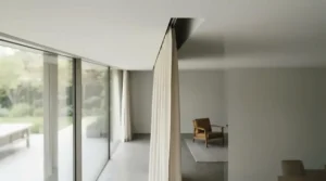 Recessed ceiling pocket highlighting a hidden curtain track vs curtain pole design.